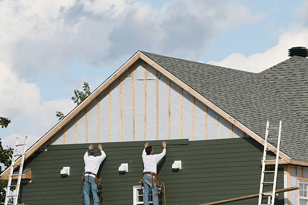 Professional Siding technician working in Brownsville, TX